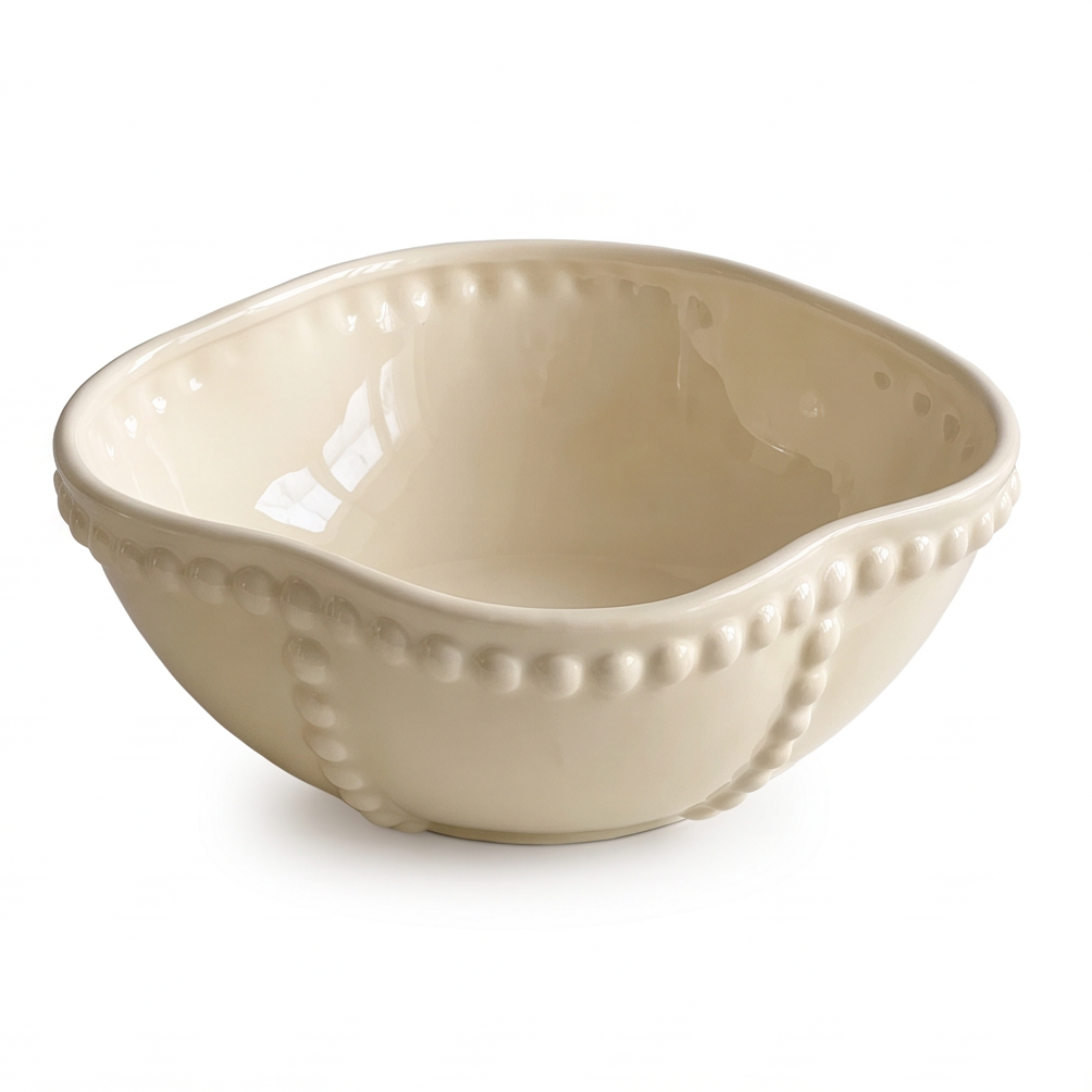 SERVICE ivory ceramic serving bowl with wavy rounded-square rim and raised beaded trim on white background