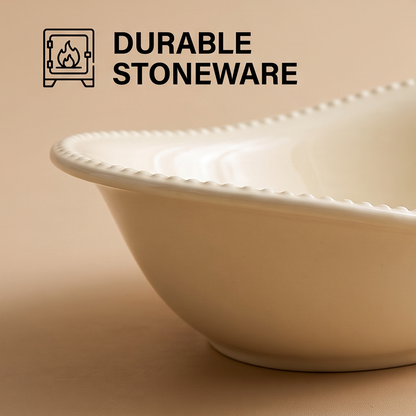 Close-up of beaded rim on ivory stoneware serving bowl