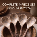 Close-up of carved-style wave pattern and dot details on dark spoon handles