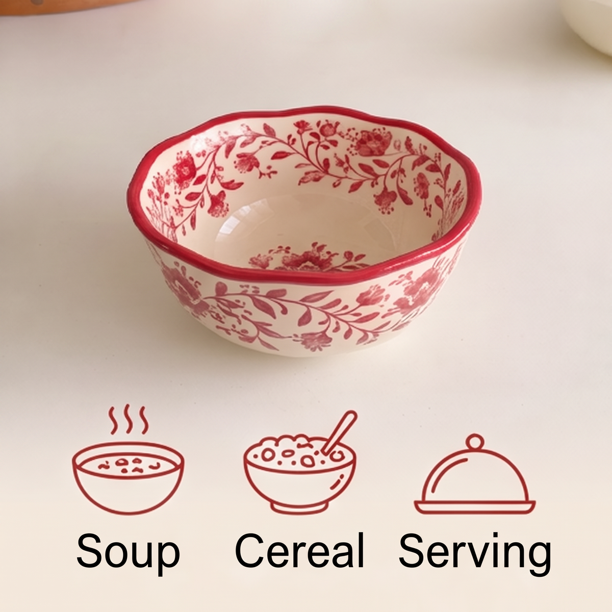 Red floral ceramic bowl with soup, cereal and serving use icons