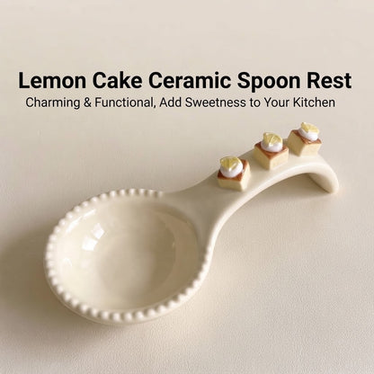 SERVICE cream ceramic lemon cake spoon rest on dining table with beaded bowl and three miniature cakes
