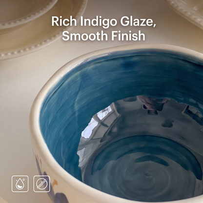 Close-up of smooth indigo glaze inside ceramic bowl